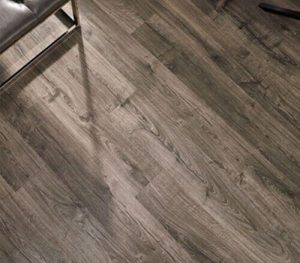 Image presents an example of laminate flooring for the Oak and Stone Floors gallery on their brand flooring products page.